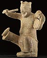 Figure of a Squatting Drummer