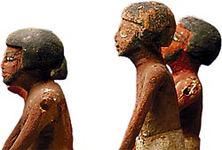 Detail of pinholes on several figures' shoulders from the Model Boat with Figures